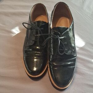Franco Sarto Black Flats with Rounded Toe and Glossy Finish